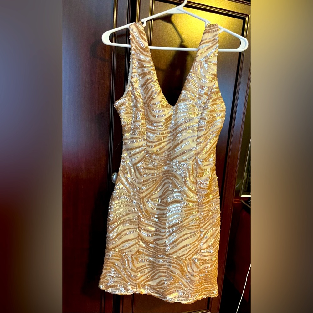 Beautiful, gold sequins, sexy low cut formal dress